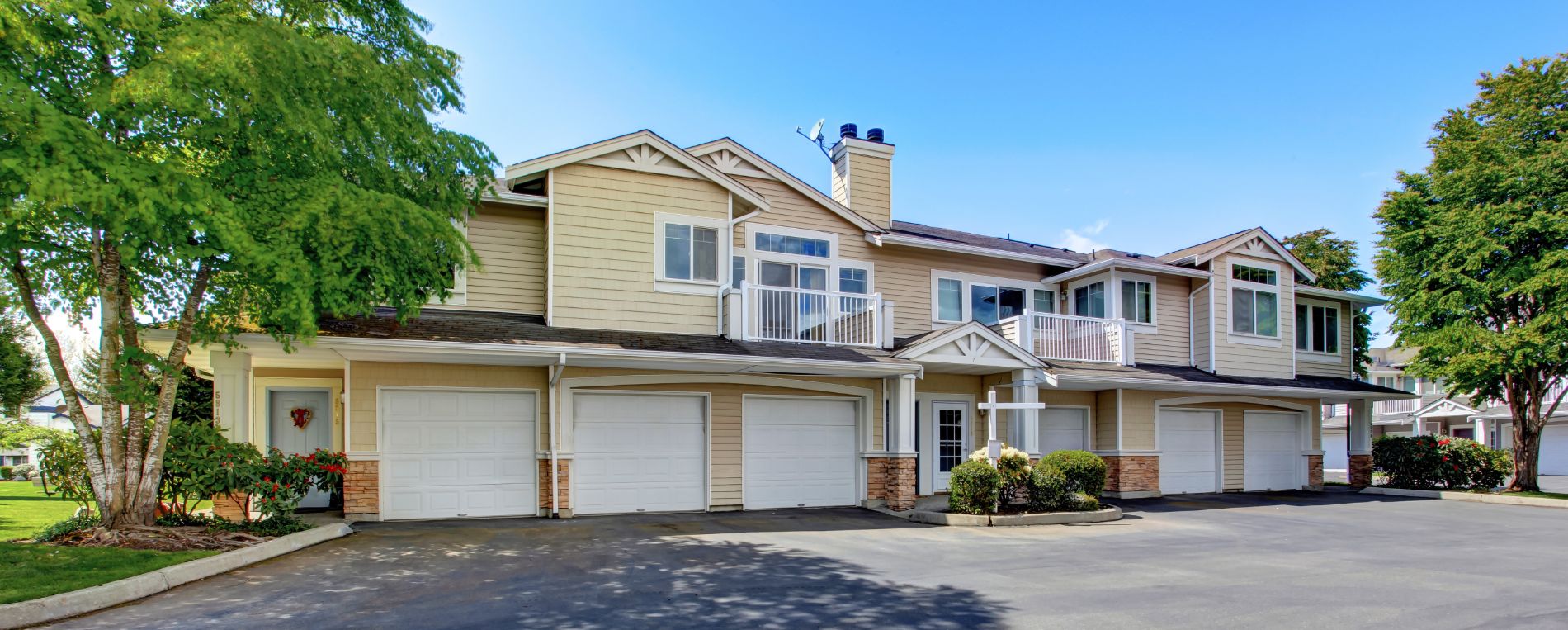 An exterior of residential house with garages